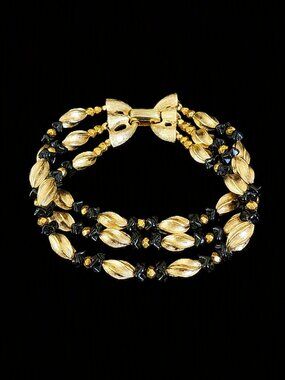 Vintage 1950s Crown Trifari Black Glass Gold Tone 3 Strand Bow Bracelet 7"